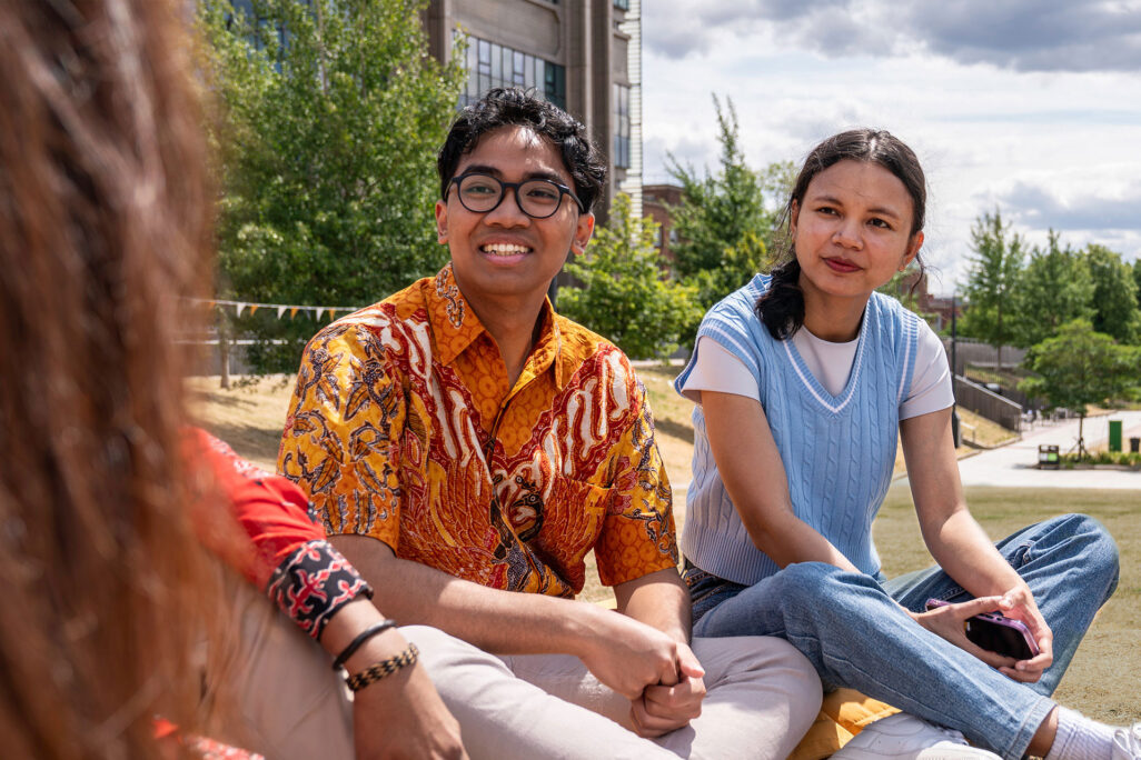 students discussing class outside
